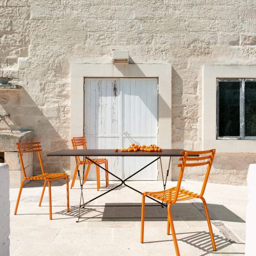 Ethimo - Flower - Oranje buitenstoel en antraciete inklapbare tafel